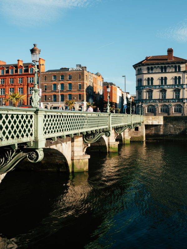 A Beautiful Sunny Day at the Green Bridge Over the River in Dublin City