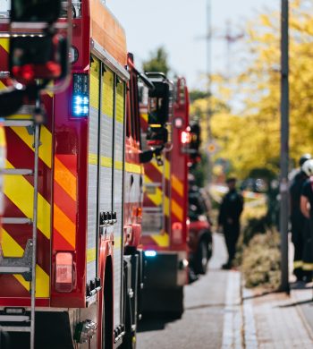 Red fire trucks in row