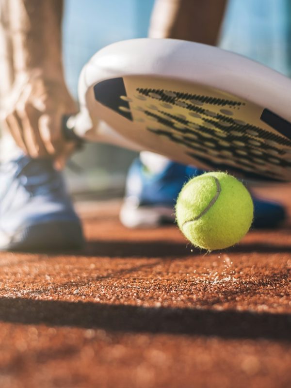 Sportsman playing padel game